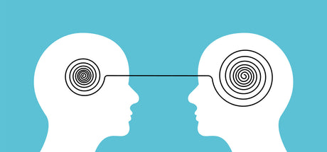 Symbolische Darstellung der Wahl zwischen Adaptogenen und Nootropika. Zwei Köpfe mit verbundenen Gedanken visualisieren die Entscheidung zwischen kognitiver Unterstützung und Stressbewältigung.